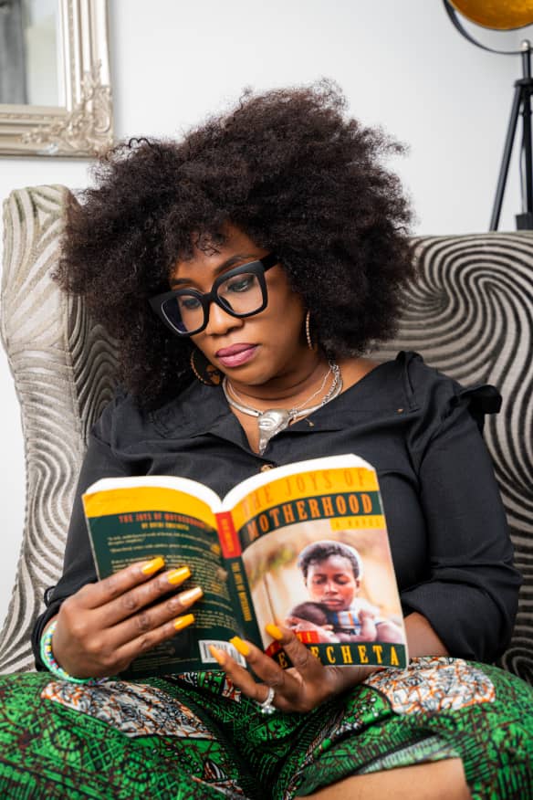 African parents and children engaged in community activities, representing The African Parent